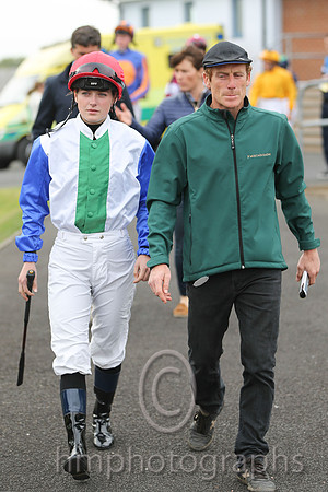 Johnny Murtagh and daughter Caroline on the way to the parade ring at Down Royal.