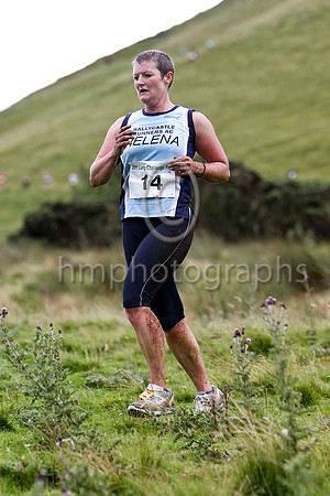 Helena Dornan , 148 overall, V35, 11th woman in 50.47 - Ballycastle AC - FT8E3535-e