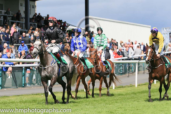 Race 4 Winner Dollar Value ridden by Mark McDonagh trained by T G McCourt - colours black, red and white cap number 1