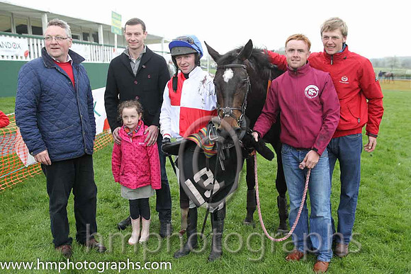 01st Oneforthenure ( 13 ) and N McParlan - Trainer : Graham McKeever - red and white qtrd plus sponsor representative Colin Kirkpatrick Sales Manager Agnew Corporate (2nd left) and daughter Holly