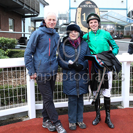 Stuart , Edith and Ben Crawford in the Winner's Enclosure after Carnfunnock trained by Stuart and ridden by brother Ben won the Workpal Flat Races on Day 1 of the Ladbrokes Festival of Racing at Down