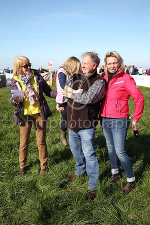 June Ferguson, a shy Georgie with her grandfather Ian and mother Louise at Portrush P2P