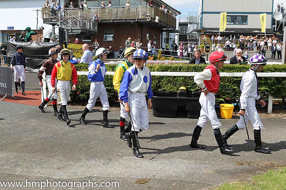Jockeys enter the parade ring for the Ulster Derby at Down Royal