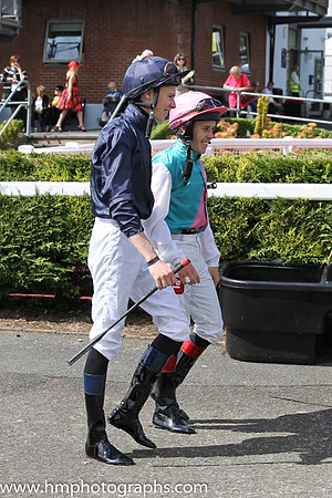 Joseph O'Brien and Leigh Roche enter the parade ring for the Ulster Derby at Down Royal
