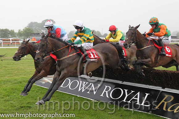 01st Elegant Statesman ( 11 , emerald green and orange hooped ) and N.P. Madden - Trainer : Henry de Bromhead - Owner : John P. McManus