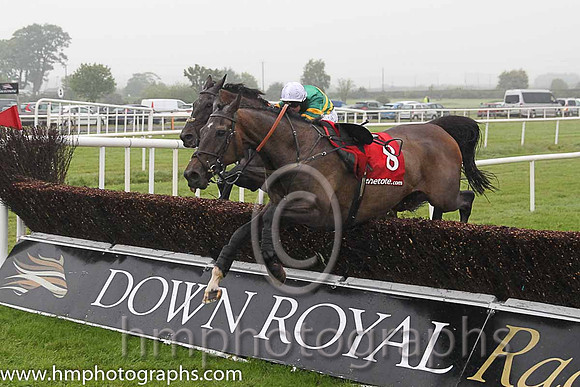 01st Elegant Statesman ( 11 , emerald green and orange hooped ) and N.P. Madden - Trainer : Henry de Bromhead - Owner : John P. McManus