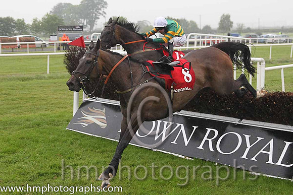 01st Elegant Statesman ( 11 , emerald green and orange hooped ) and N.P. Madden - Trainer : Henry de Bromhead - Owner : John P. McManus