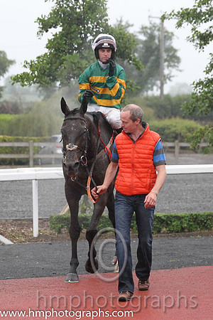 01st Elegant Statesman ( 11 , emerald green and orange hooped ) and N.P. Madden - Trainer : Henry de Bromhead - Owner : John P. McManus