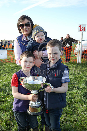 Laura McAleese, owner of Rossamilan winner of the Macauley Wray LLP Maiden Race for 6-Y-O and Upwards Geldings and Novice Riders at the Route P2P at Portrush , wife of trainer Paul McAleese and child