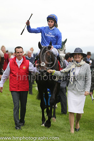 William Haddis and Jack Hobbs on the victory parade after winning the Dubai Duty Free Irish derby at the Curragh