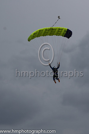 Member of the Irish Parachute Club descending to the track at the Irish Derby at the Curragh