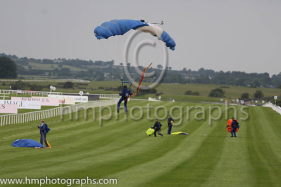 Member of the Irish Parachute Club descending to the track at the Irish Derby at the Curragh