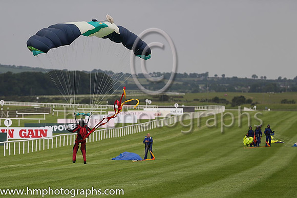 Member of the Irish Parachute Club descending to the track at the Irish Derby at the Curragh