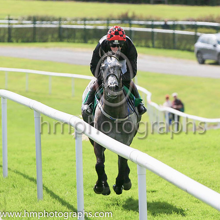 Race 4 Winner Dollar Value ridden by Mark McDonagh trained by T G McCourt - colours black, red and white cap number 1