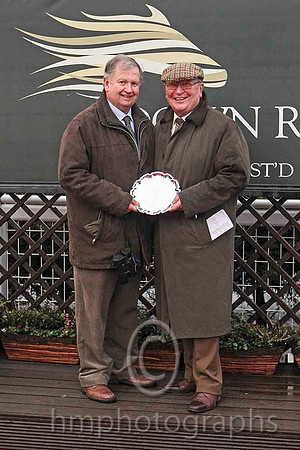 01st - Presentation to I R (Ian) Ferguson trainer of winner Ceasar Milan - (9, white, royal blue panel) - CU2D5685-e2
