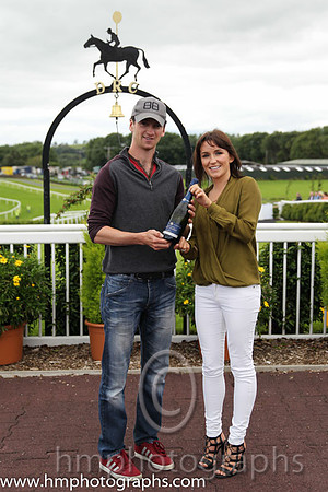Race 2 - Lauren Toal present a prize to Patrick Mullins son of winning trainer Willie Mullins