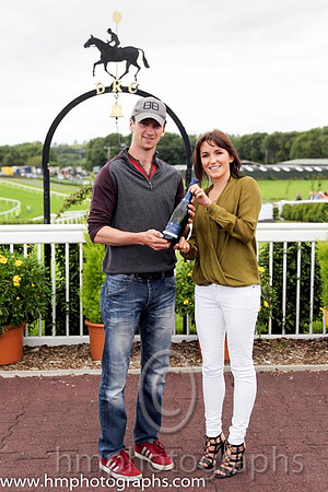 Race 2 - Lauren Toal present a prize to Patrick Mullins son of winning trainer Willie Mullins