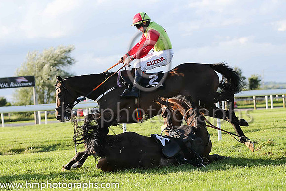 Fell - Redrobin and David Mulline (14, pink and grey diamonds) trainer David Harry Kelly - horse and rider were ok
