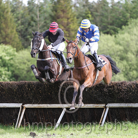 R4 Ben Crawford on Onefortheroadmac (2nd) and Noel McParlan on Carsonstown Boy (winner) clear the last - FT8E5713-e