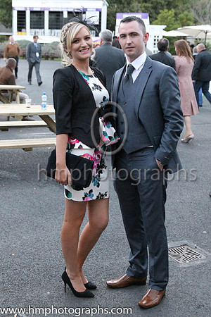 Couple at the Longines Irish Champions weekend at Loopardstown