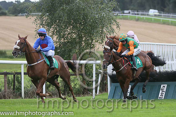 05th Coolfore Jack ( 4 , emerald green, orange spots ) and M.P. Fogarty - Trainer : C.A.Murphy - Owner : A.T. Battersby/S. Delaney