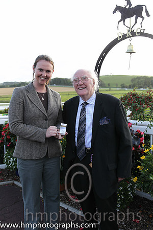 Ruth Black present Tommy Carson with a Diamond Ring which he won in a draw at Downpatrick