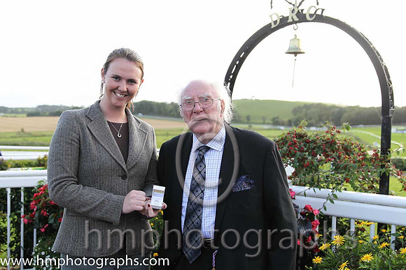 Ruth Black present Tommy Carson with a Diamond Ring which he won in a draw at Downpatrick