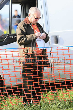 Marking the card at The Route Point to Point at Portrush