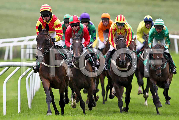 Tear Drops in the lead, finished 4th, Jockey Mr J P McKeown, winner Stigh Collain 3rd from right partially hidden green yellow seams , Jockey Miss N Carberry - FT8E1784-e