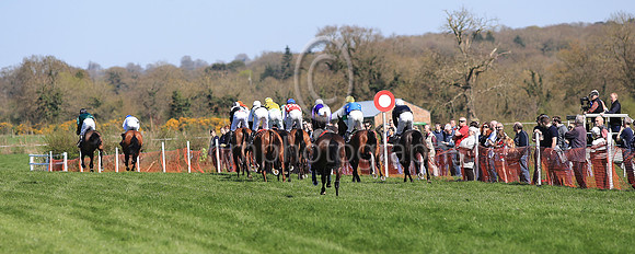 Horses and riders pass the post on a circuit of the Killultagh, Old Rock and Chichester HUnt P2P at Largy near Crumlin