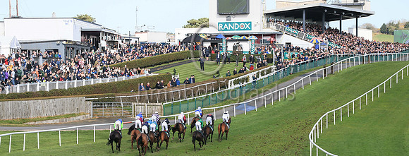 Horses round the bend at Downpatrick in front of large crowds in the Randox Ulster National.