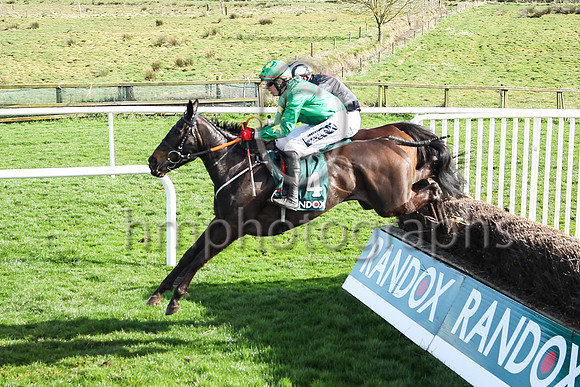 Malina Girl ridden by Keith Donoghue jump the last to go to win the Randox Ulster National Handicap Steeplechase at DOnwpatrick on 2nd April 2023. Maina Girl is trained by Gavin Cromwell, bred by Will