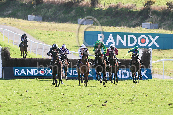 Malina Girl(4, green) ridden by Keith Donoghue approach the last to go to win the Randox Ulster National Handicap Steeplechase at DOnwpatrick on 2nd April 2023. Maina Girl is trained by Gavin Cromwell