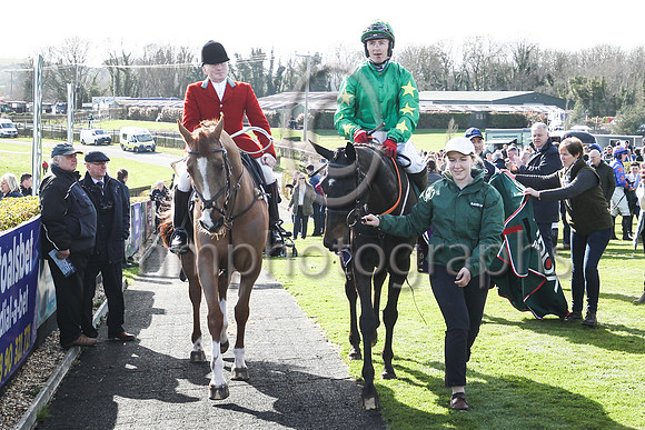 Malina Girl and rider Keith Donoghue enter the winner's enclosure after winning the win the Randox Ulster National Handicap Steeplechase at Downpatrick on 2nd April 2023. Malina Girl is trained by Gav