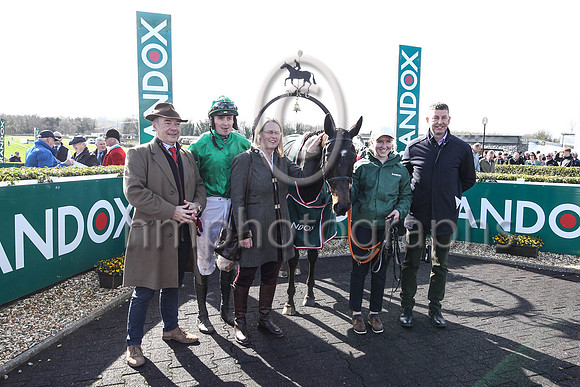 malina Girl and rider Keith Donoghue jump in the winners enclosure after winning the Randox Ulster National Handicap Steeplechase at Downpatrick on 2nd April 2023. malina Girl is trained by Gavin Crom