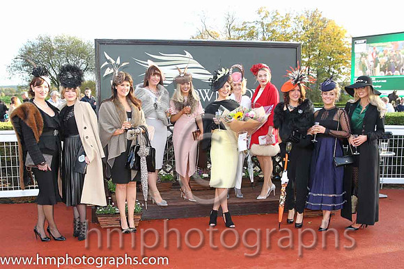 Sarah McEvoy from Jonesborough winner of the Victoria Square Best Dressed Lady Competition at Down Royal with other finalists