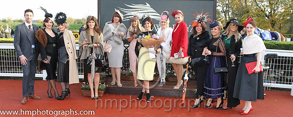 Sarah McEvoy from Jonesborough winner of the Victoria Square Best Dressed Lady Competition at Down Royal with other finalists and judges