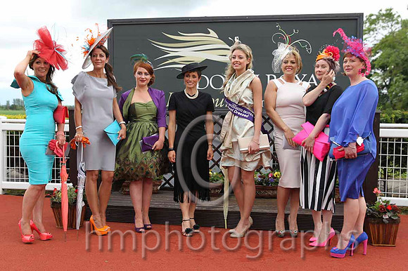June Burgess of the Fitzwilliam Hotel (in black outfit) with the finalists in the Fitzwilliam Hotel best dressed competition at Down Royal - FT8E6395-21