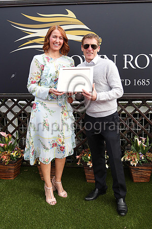 Julia Galbraith of Magners presents winning trophy to J P Murtagh winning trainer of Sankaru Royale