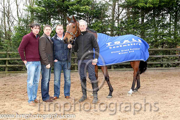 Colm McDonnell, with brothers Conor & Chris, owner of Hidden Horizons winner of the Toals bookmakers Ulster Grand National at Downpatrick. Trainer Stuart Crawford is right of picture - CU2D1415-Edit-1