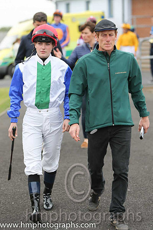 Johnny Murtagh and daughter Caroline on the way to the parade ring at Down Royal.