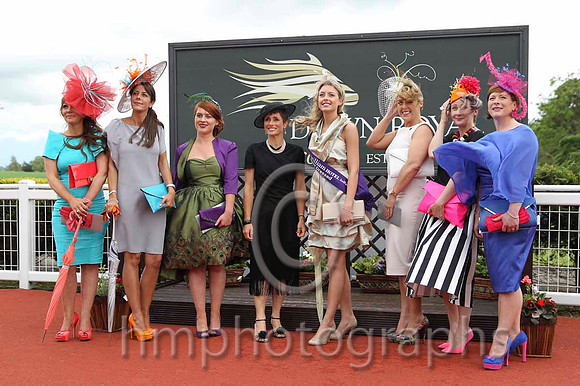 June Burgess of the Fitzwilliam Hotel (in black outfit) with the finalists in the Fitzwilliam Hotel best dressed competition at Down Royal - FT8E6387-15