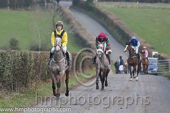 01st SIXTEEN AGAIN and M J O'Hare ( 13 , YELLOW,black chevron; yellow, plain sleeves; white  yellow check cap ) Trainer: B.P. Galvin,, Owner : Noreen Galvin on the way to the start