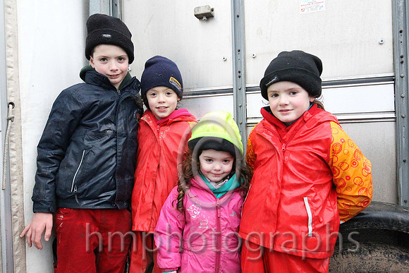 The Gilchrist family - Brendan, Jennifer, Aoife and Sarah from Ballycruttle near Downpatrick shelter from the wind and rain at Tyrella P2P.