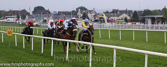 01st dh Whiteout (GER) ( 5 , yellow  royal blue stripes ) and D.P. McDonogh - Trainer : W.P. Mullins - Owner : D.Lawlor