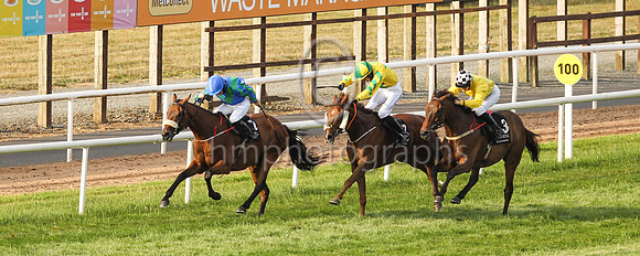 New Sodiety and Sorcha Woods (1, royal blue, emerald green chevron ) in the lead to win the Molson Coors Beverage Company Apprentice Handicap at Down Royal on Friday 23rd July 2021