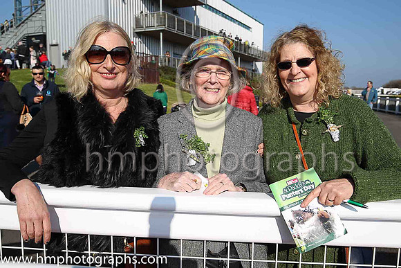 Jane O'Neill, Delores Black and Delores Vischer from Belfast wearing the shamrock at Down royal on St Patricks Day