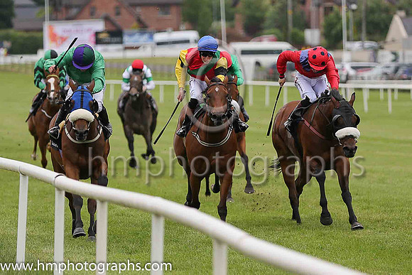01st Forbear and Wayne Lordan (emerald green and purple and dark green cap) , trainer P Twomey win the Value Cabs Handicap at Down Royal