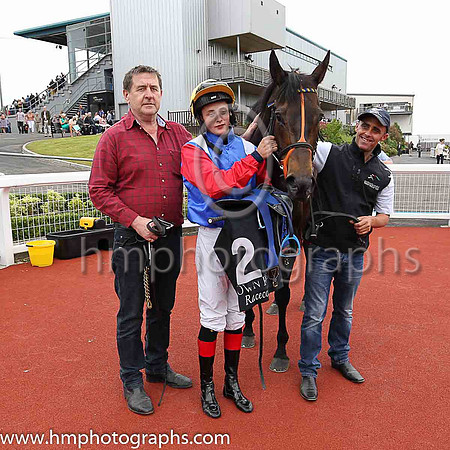 01st Lady Mega and Robbie Downey , trainer Edward Lynam winners of The Louis Roederer Handicap at Down Royal