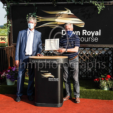 Michael Roden Owner of Down Royal with Assistant Trainer to Joseph O'Brien Brendan Powell in the winners enclosure after Master of Reality won Her Majesty's Plate at Down Royal on 23rd July 2021 at D